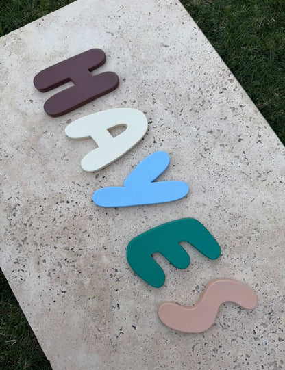 Custom Handmade Clay Name Sign Personalized Nursery Kids Room Wall DecCreate a personalized nursery kids room wall decor with a Custom Handmade Clay Name Sign crafted in the signature PIPPI Ceramics font. Each letter is individually hapippi ceramicsPippi CeramicsPippi Ceramicsnursery kids room wall decor