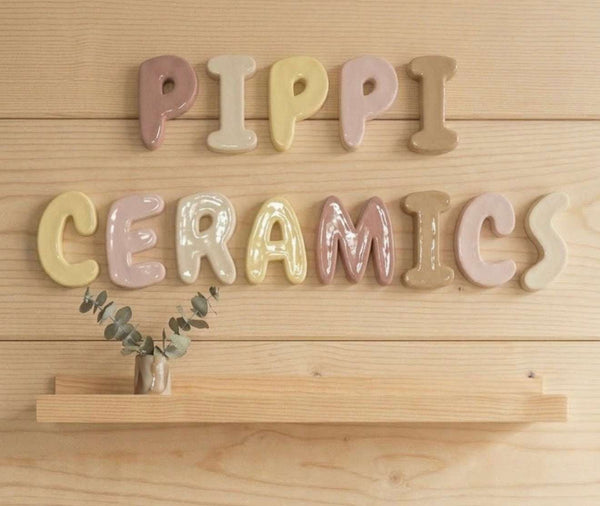 Handmade Ceramic Clay Letter Personalised Nursery Wall Letter Pippi CeCreate a personalized space with a handmade ceramic clay letter from Pippi Ceramics. Each ceramic letter is individually handcrafted, glazed, and painted to order, mpippi ceramicsPippi CeramicsPippi CeramicsCeramic
